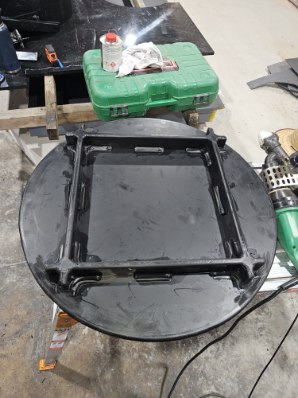 HDPE frame section welded onto a round black plate