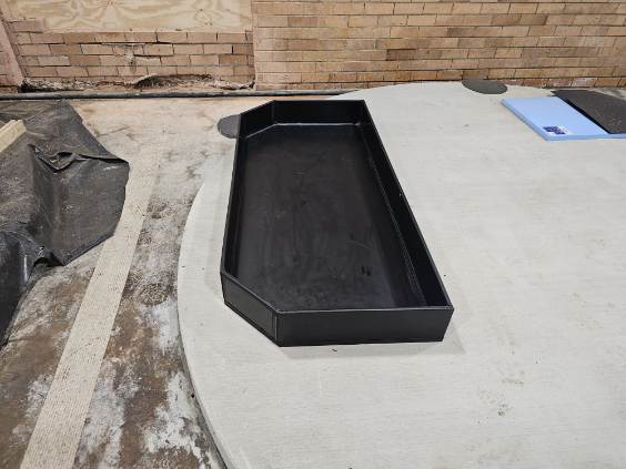Finished custom HDPE tray outside the workshop