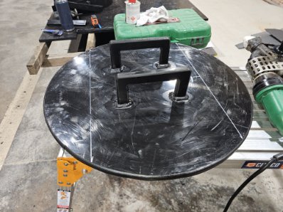 Fabricated HDPE lid with welded handle on the workshop bench
