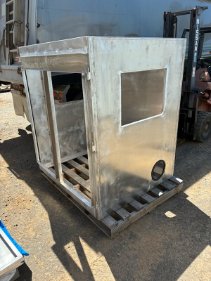 Alloy cabinet on a fabricated base frame with side window and pipe outlet